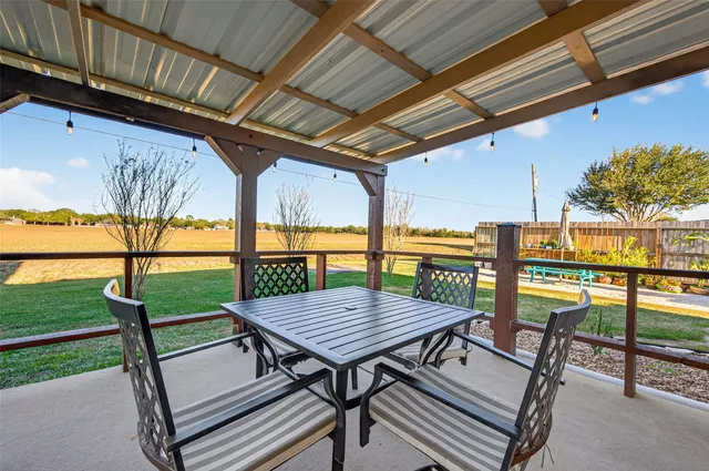 a wooden bench sitting in the middle of a building