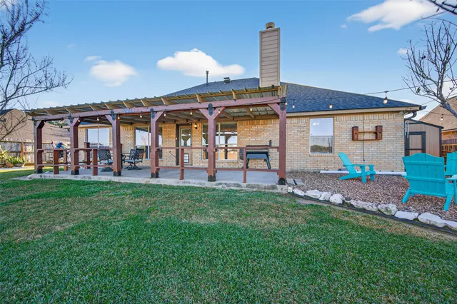 a childrens park with lots of swings and slides