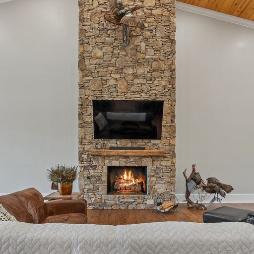 8321 Ebenezer Road Buena Vista, GA 31803 - Photo 29 of 61 Stacked Stone Fireplace soars to 22 ft at peak