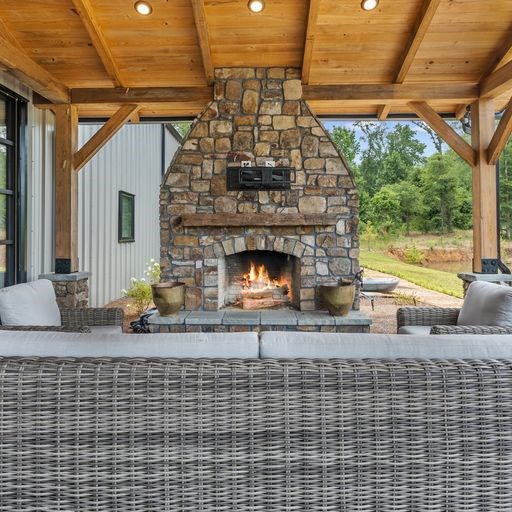 8321 Ebenezer Road Buena Vista, GA 31803 - Photo 44 of 61 Outdoor Fireplace overlooks pond