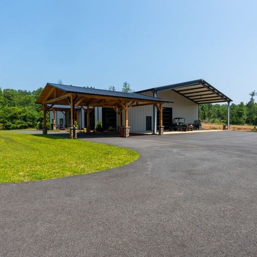 8321 Ebenezer Road Buena Vista, GA 31803 - Photo 6 of 61 Covered Parking with exposed cedar planks and stac