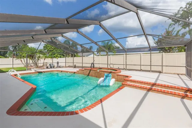 a view of a backyard with a patio