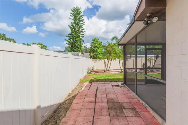 an aerial view of residential houses with city view