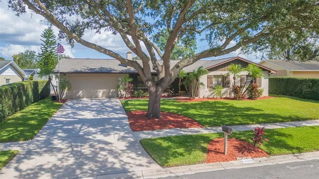 an aerial view of residential building with parking space