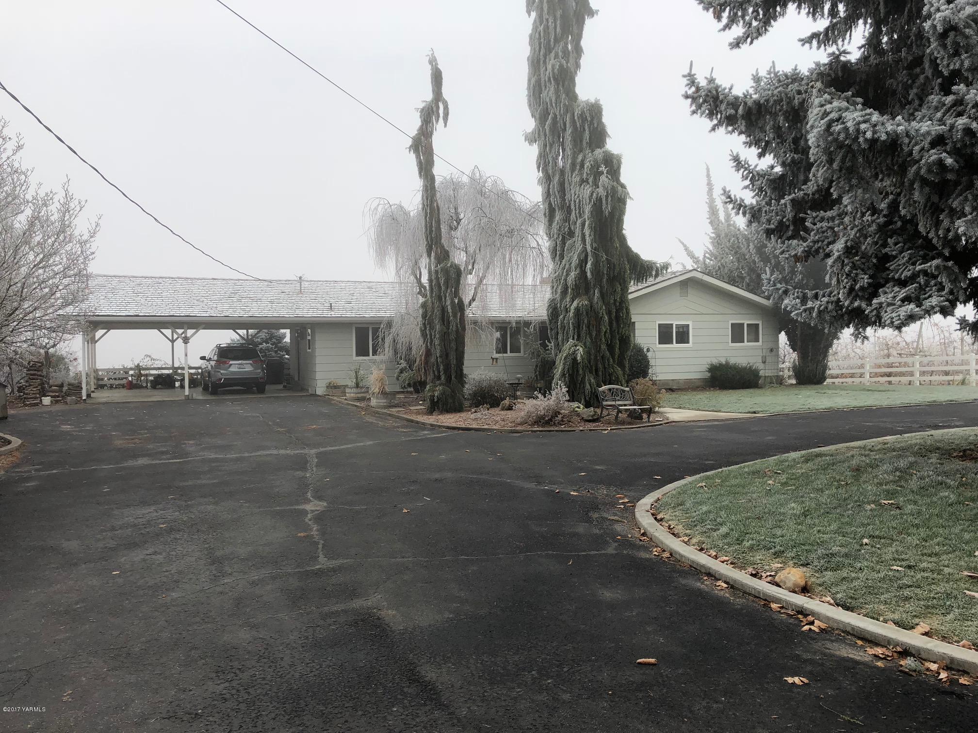 139601 Mccredie Road West Prosser, WA 99350 - Photo 3 of 55 a view of a street with houses