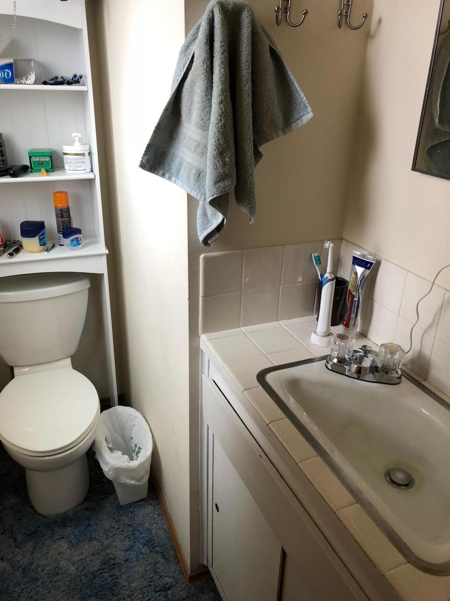 139601 Mccredie Road West Prosser, WA 99350 - Photo 43 of 55 a bathroom with a toilet and a sink