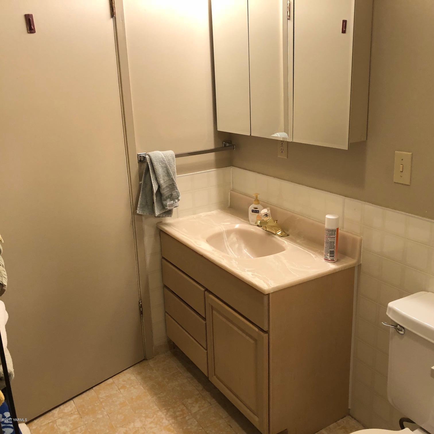 139601 Mccredie Road West Prosser, WA 99350 - Photo 49 of 55 a bathroom with a sink toilet and vanity