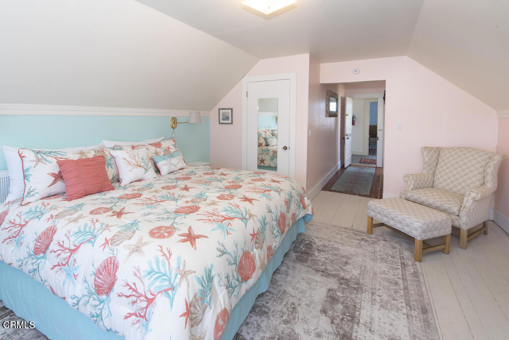 700 North Main Street Fort Bragg, CA 95437 - Photo 16 of 64 a bedroom with a bed and a couch