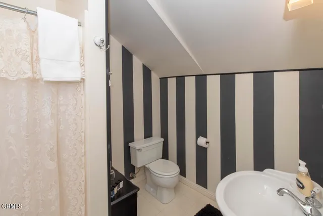 a aerial view of a house with a garden and plants