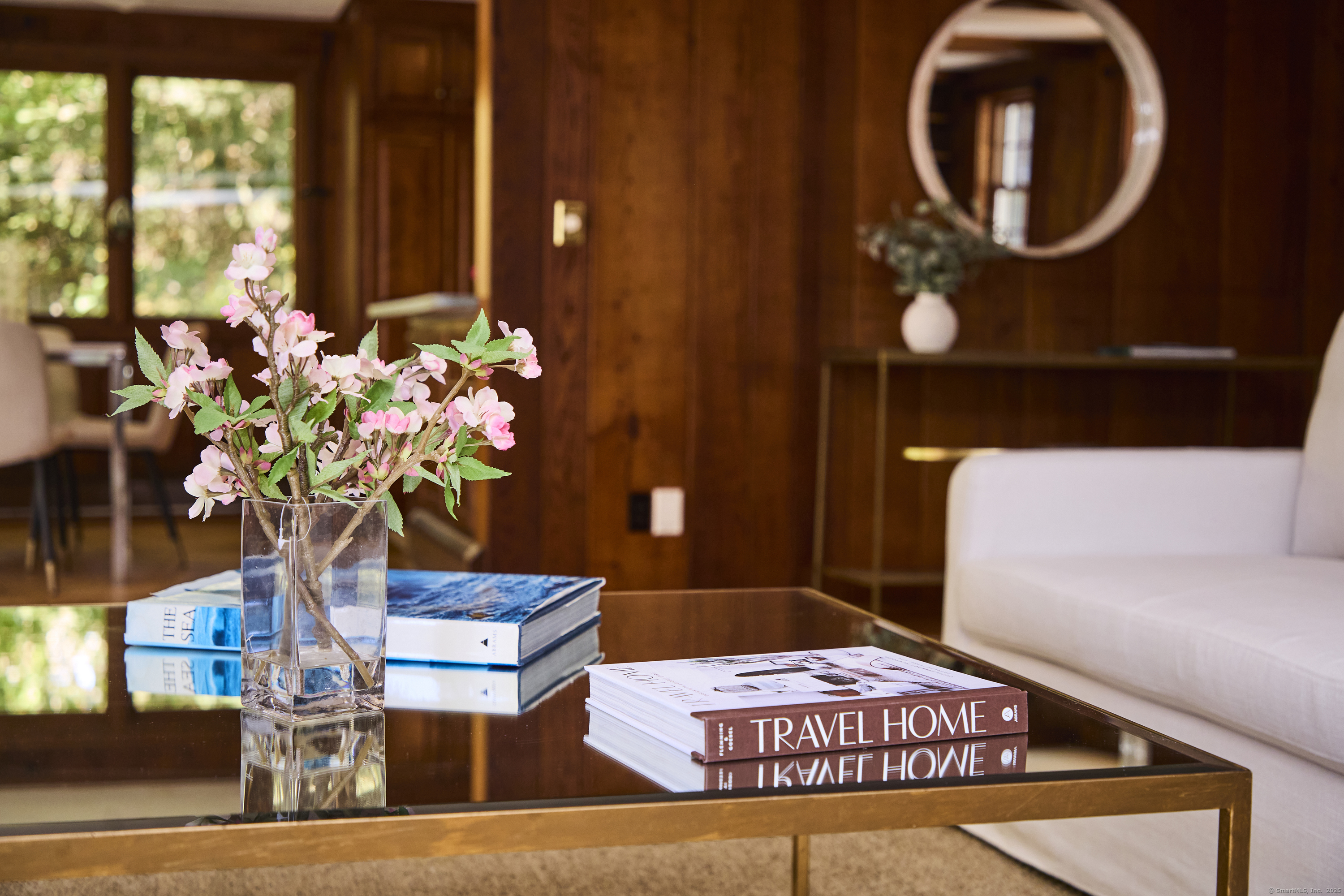 136 Lyons Plain Road Weston, CT 06883 - Photo 5 of 31 a living room with furniture and a potted plant