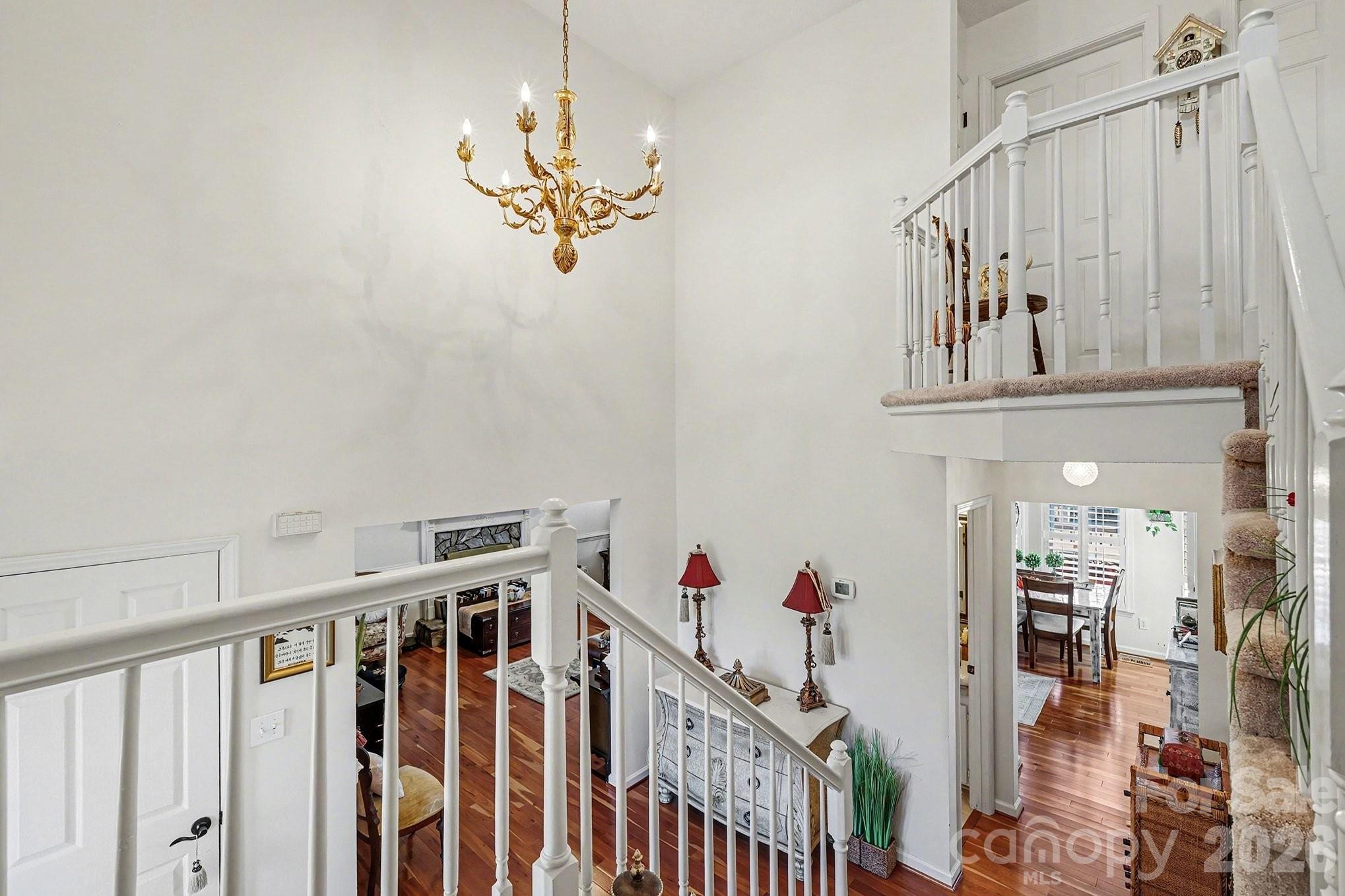 205 John Cline Road Cherryville, NC 28021 - Photo 15 of 41 a view of a hallway with a chandelier