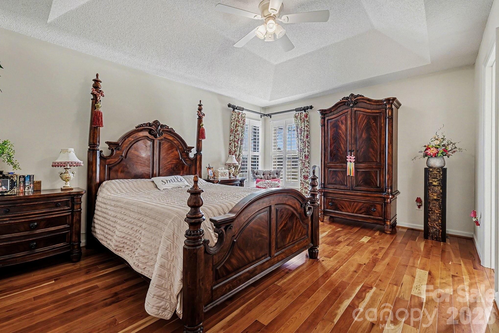 205 John Cline Road Cherryville, NC 28021 - Photo 16 of 41 a bedroom with a bed and wooden floor