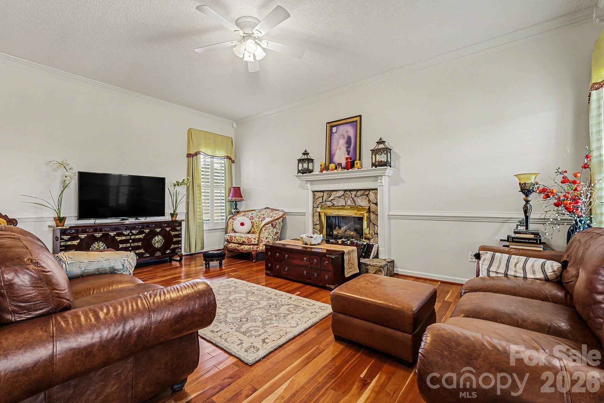 205 John Cline Road Cherryville, NC 28021 - Photo 22 of 41 a living room with furniture and a flat screen tv