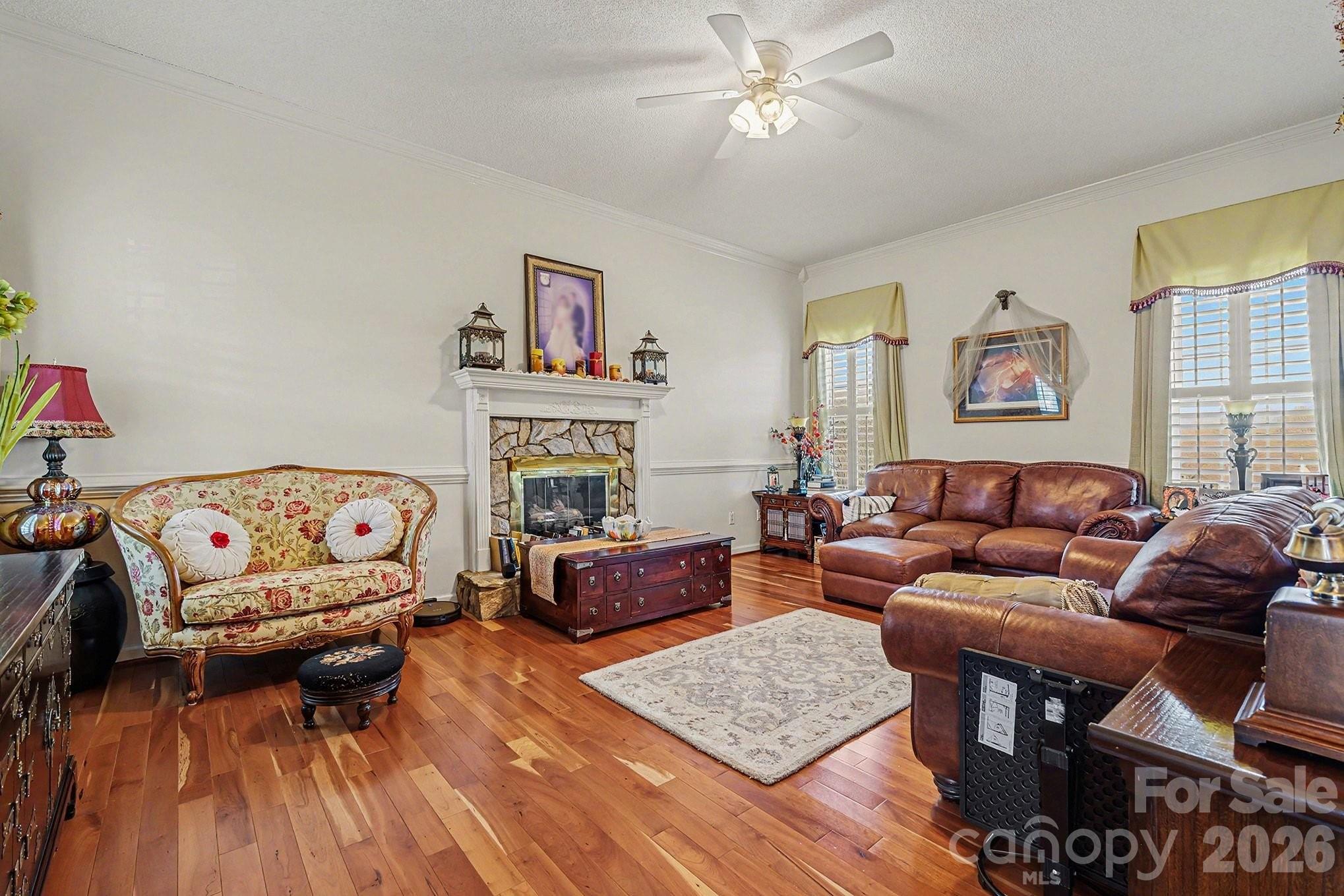 205 John Cline Road Cherryville, NC 28021 - Photo 23 of 41 a living room with furniture and a fireplace