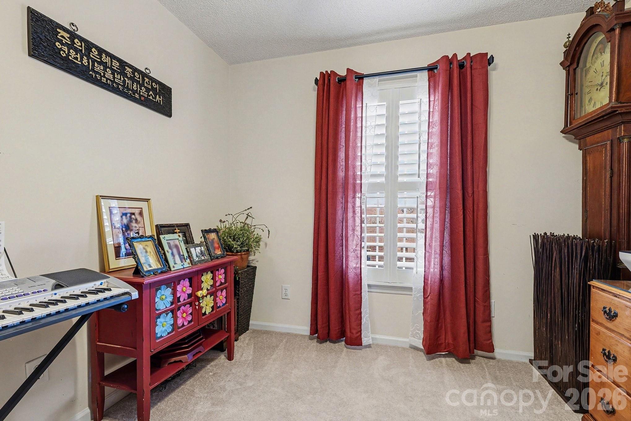 205 John Cline Road Cherryville, NC 28021 - Photo 29 of 41 a living room with furniture a flat screen tv and a window