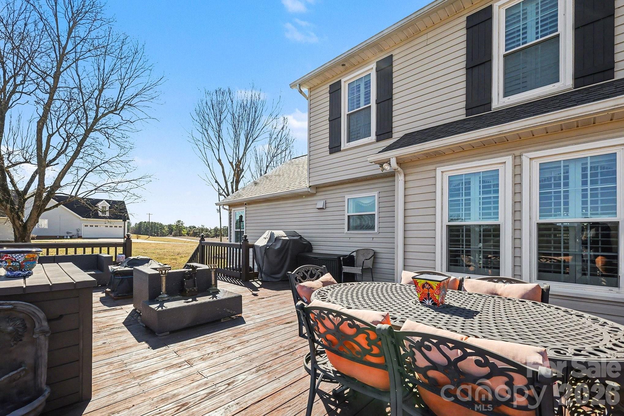 205 John Cline Road Cherryville, NC 28021 - Photo 33 of 41 a view of a patio with couches chairs and wooden floor