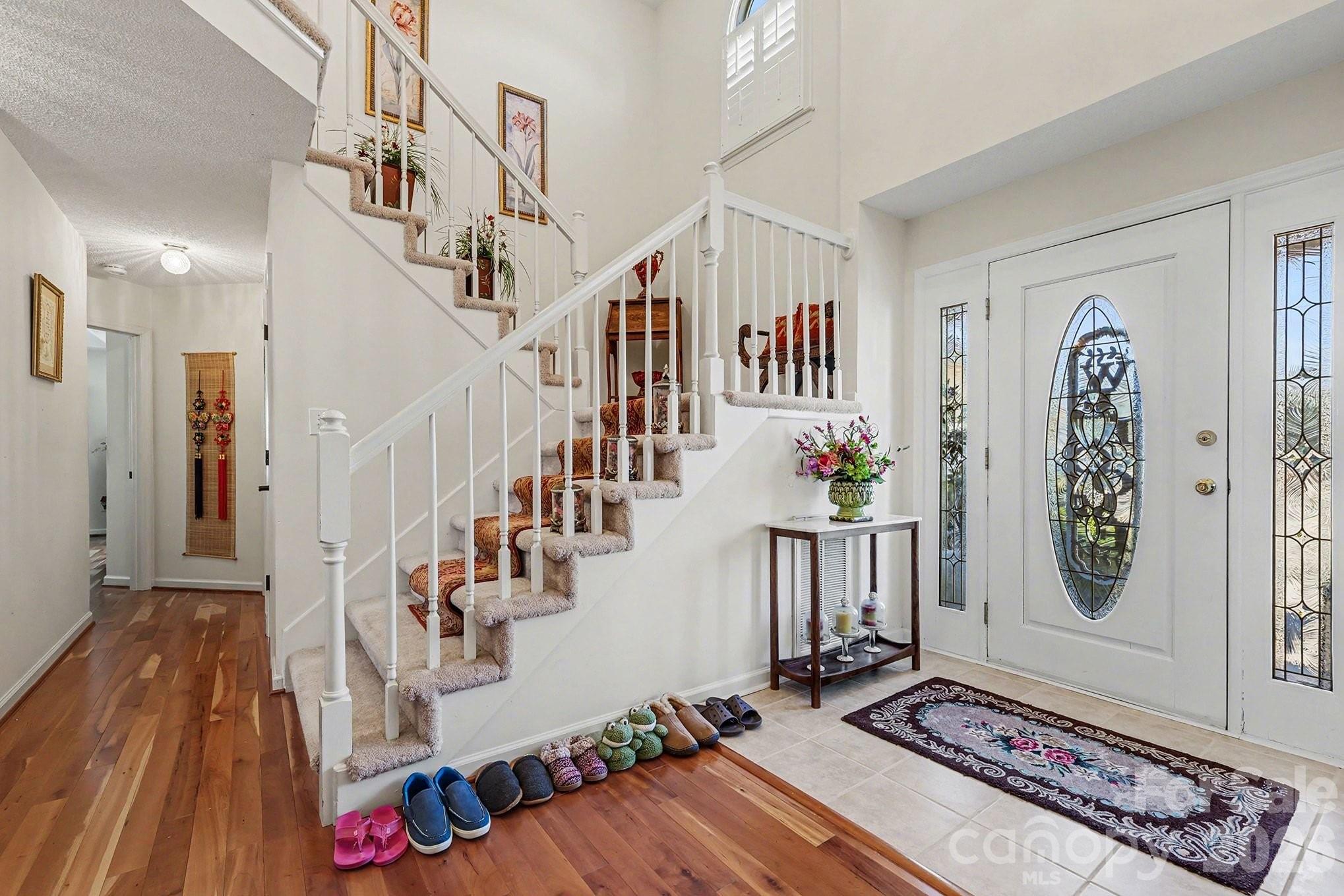205 John Cline Road Cherryville, NC 28021 - Photo 5 of 41 a living room with wooden floor and stairs