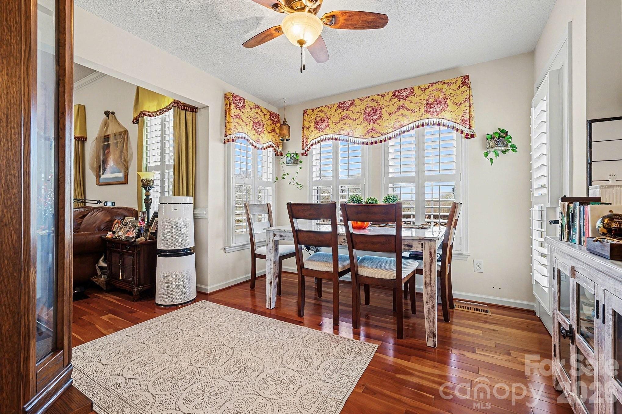 205 John Cline Road Cherryville, NC 28021 - Photo 7 of 41 a view of a dining room with furniture window and wooden floor