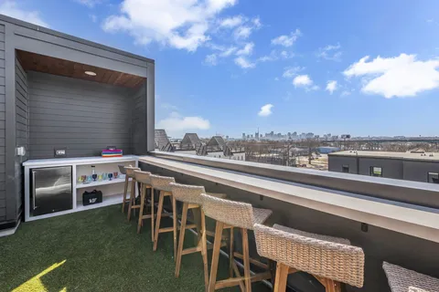 a view of dinning table and chairs in the terrace