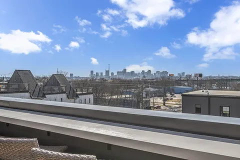 a view of a balcony with city view
