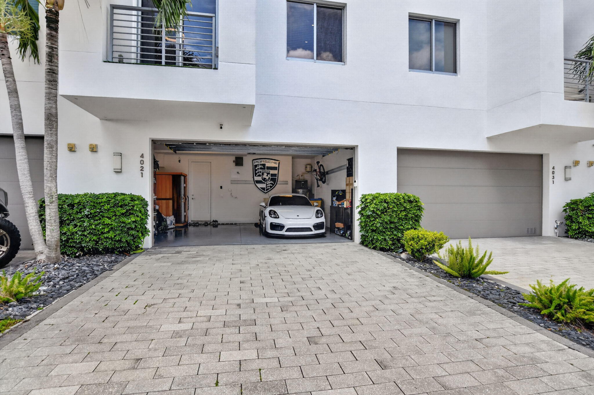 4021 Northwest 18th Way Boca Raton, FL 33431 - Photo 34 of 37 a car parked in front of a building