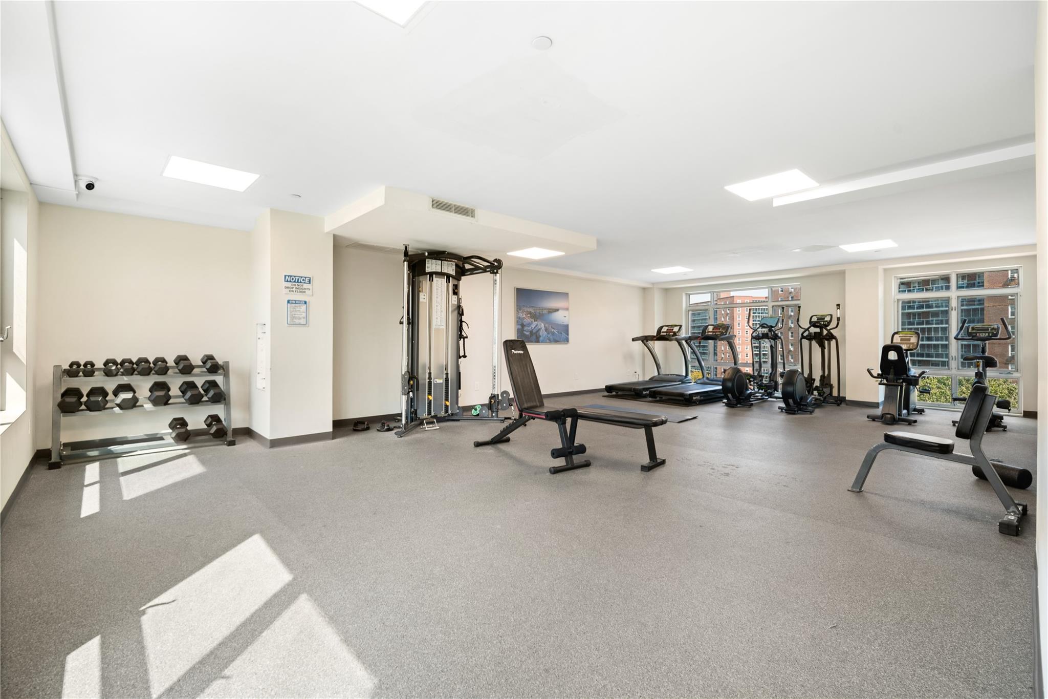 9745 63rd Drive, Unit 7A Queens, NY 11374 - Photo 16 of 20 a view of a room with gym equipment