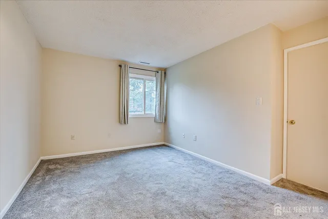 a view of an empty room with window