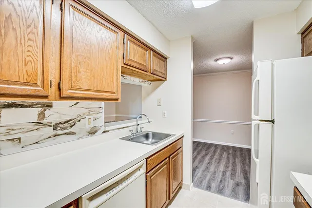 a bathroom with a sink and a window