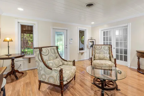 a bedroom with a bed and a table