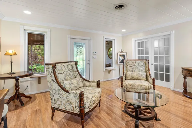 a bedroom with a bed and a table