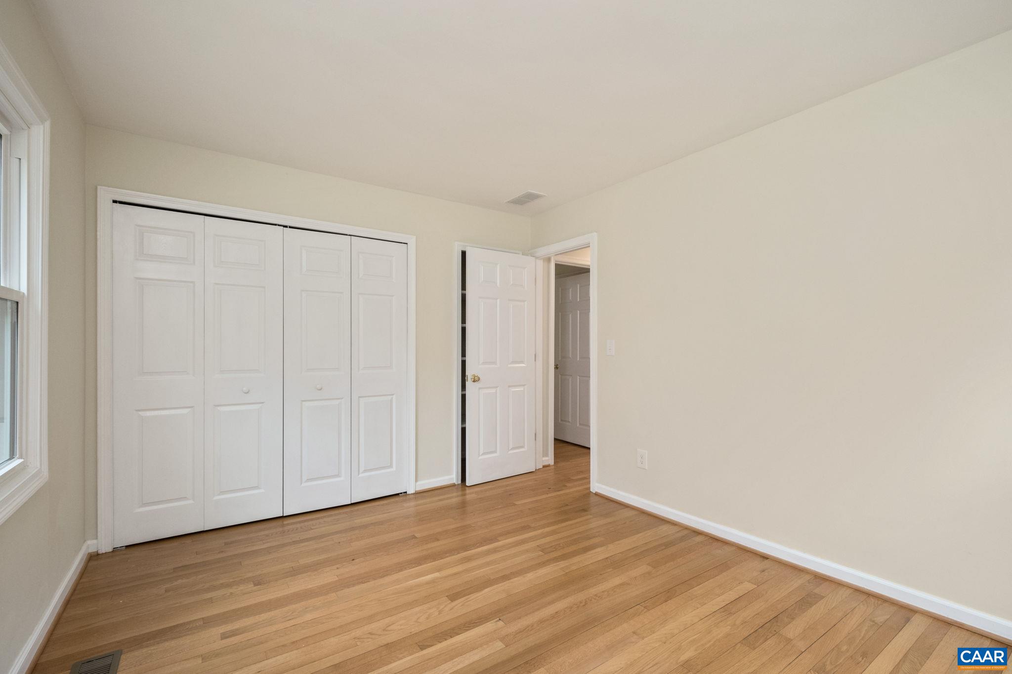 1680 Craigs Store Road Afton, VA 22920 - Photo 34 of 57 a view of an empty room with wooden floor