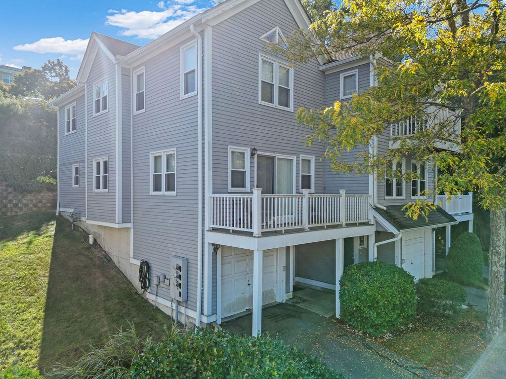 1810 Highland Avenue, Unit 22 Fall River, MA 02720 - Photo 1 of 33 a view of a house with backyard and trees