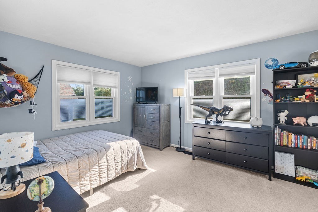 1810 Highland Avenue, Unit 22 Fall River, MA 02720 - Photo 22 of 33 a bedroom with furniture and a window