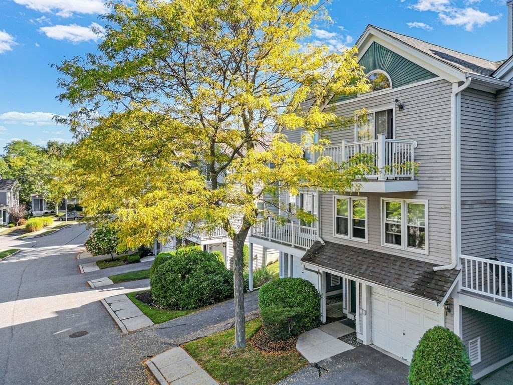 1810 Highland Avenue, Unit 22 Fall River, MA 02720 - Photo 9 of 33 front view of a house with a yard