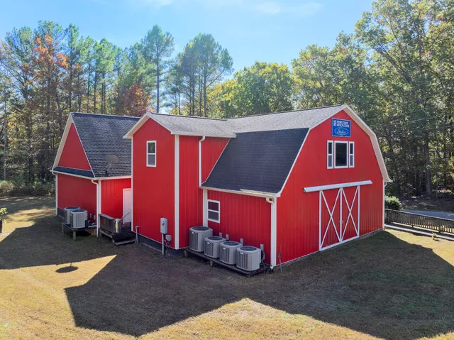 a view of a chairs in front of a house