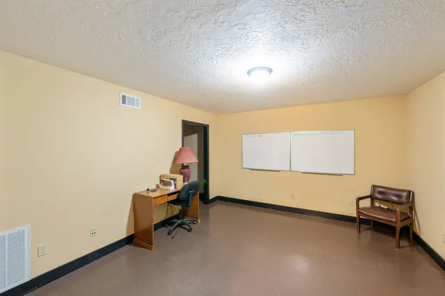 a bathroom with a sink and a large mirror