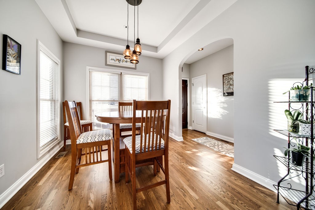 4945 Charles Dorris Road Springfield, TN 37172 - Photo 12 of 41 a view of a dining room with furniture window and wooden floor