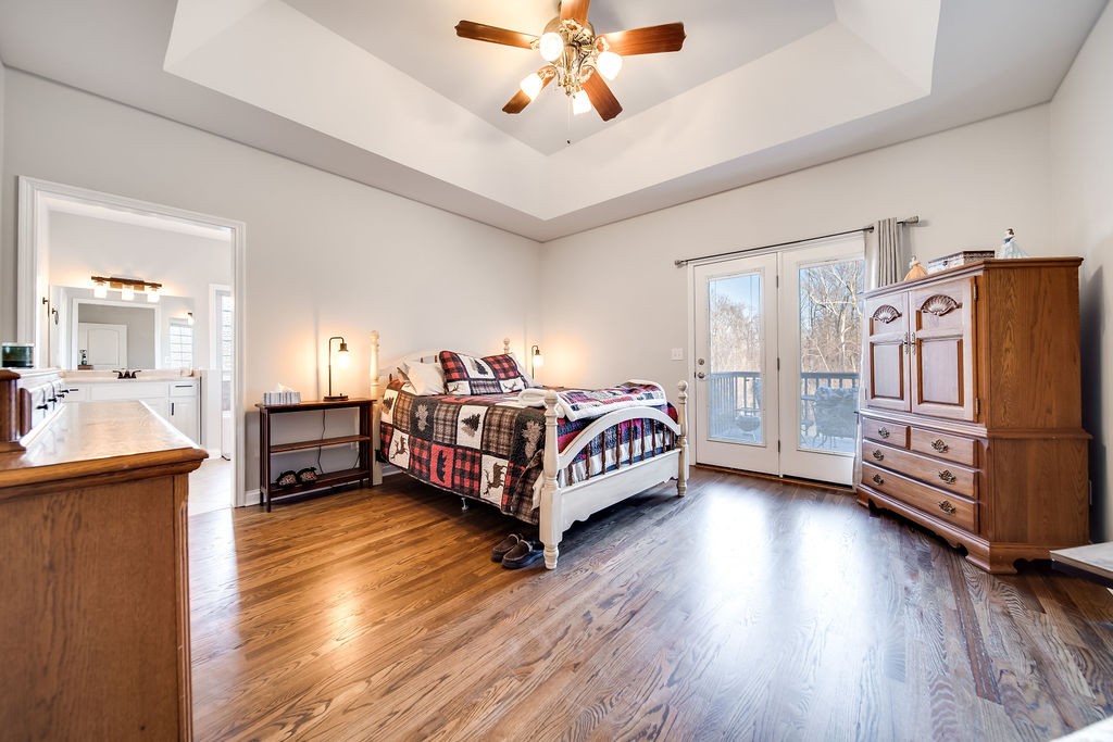4945 Charles Dorris Road Springfield, TN 37172 - Photo 24 of 41 a bed room with furniture and wooden floor