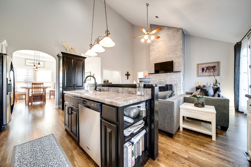 4945 Charles Dorris Road Springfield, TN 37172 - Photo 37 of 41 a kitchen with a stove and a wooden floor