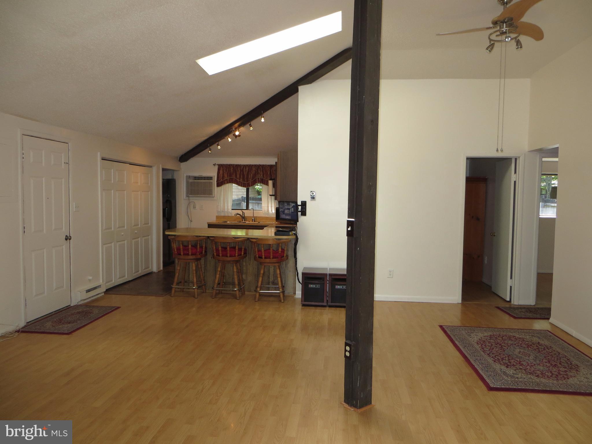 89 Ruffed Grouse Lane Hedgesville, WV 25427 - Photo 18 of 26 Great Room w/2 Skylights and Vaulted Ceiling
