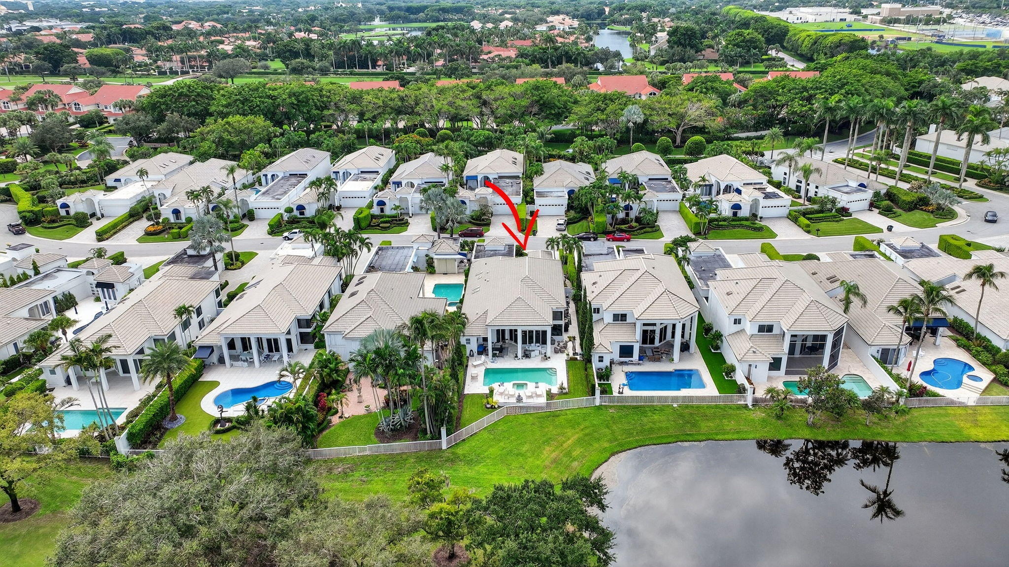 2563 Northwest 63rd Street Boca Raton, FL 33496 - Photo 64 of 65 an aerial view of residential houses with outdoor space and street view