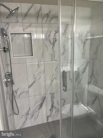 a close view of sink and cabinets