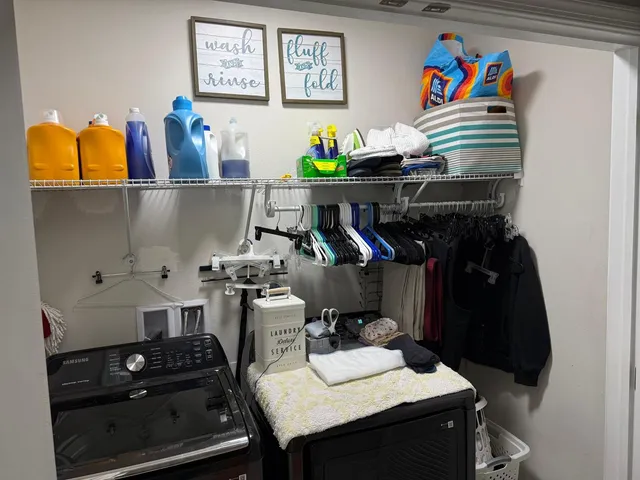 a kitchen with a stove and cabinets