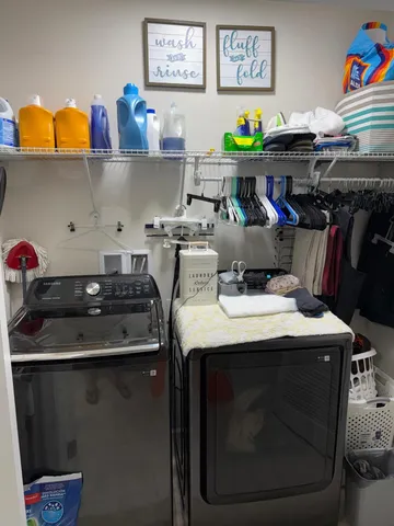 a utility room with dryer and washer