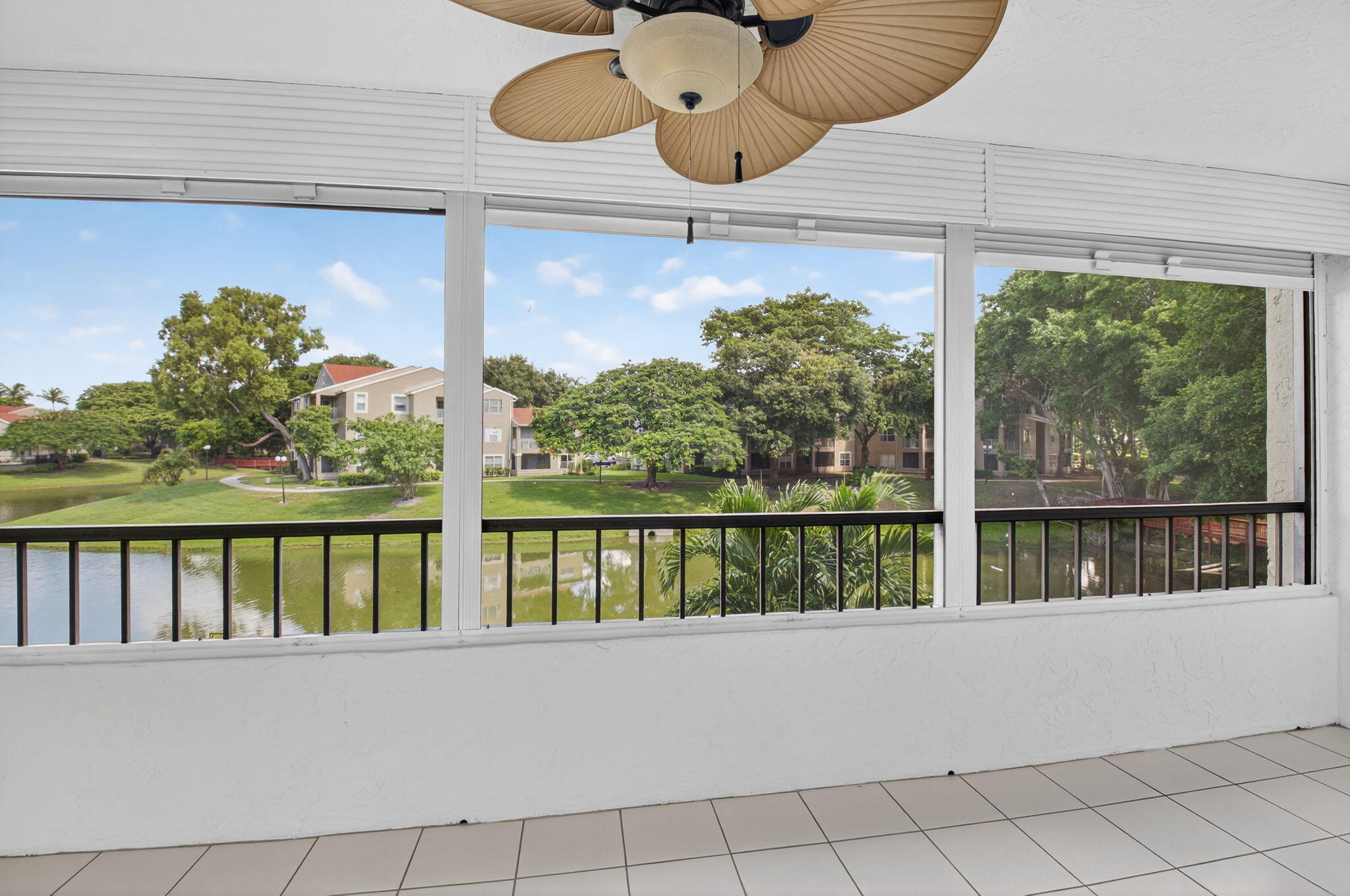 1850 Homewood Boulevard, Unit 214 Delray Beach, FL 33445 - Photo 20 of 38 a view of swimming pool from a balcony