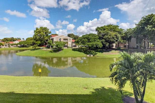 a view of a lake with a big yard