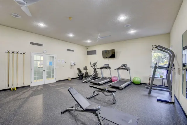 a view of a room with gym equipment
