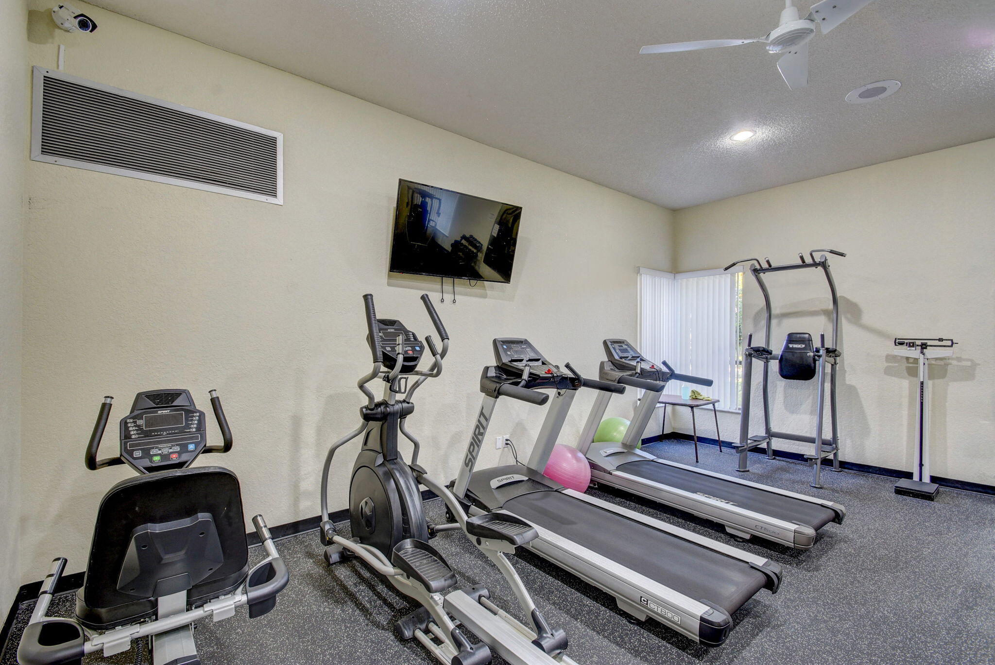 1850 Homewood Boulevard, Unit 214 Delray Beach, FL 33445 - Photo 32 of 38 a view of a room with gym equipment