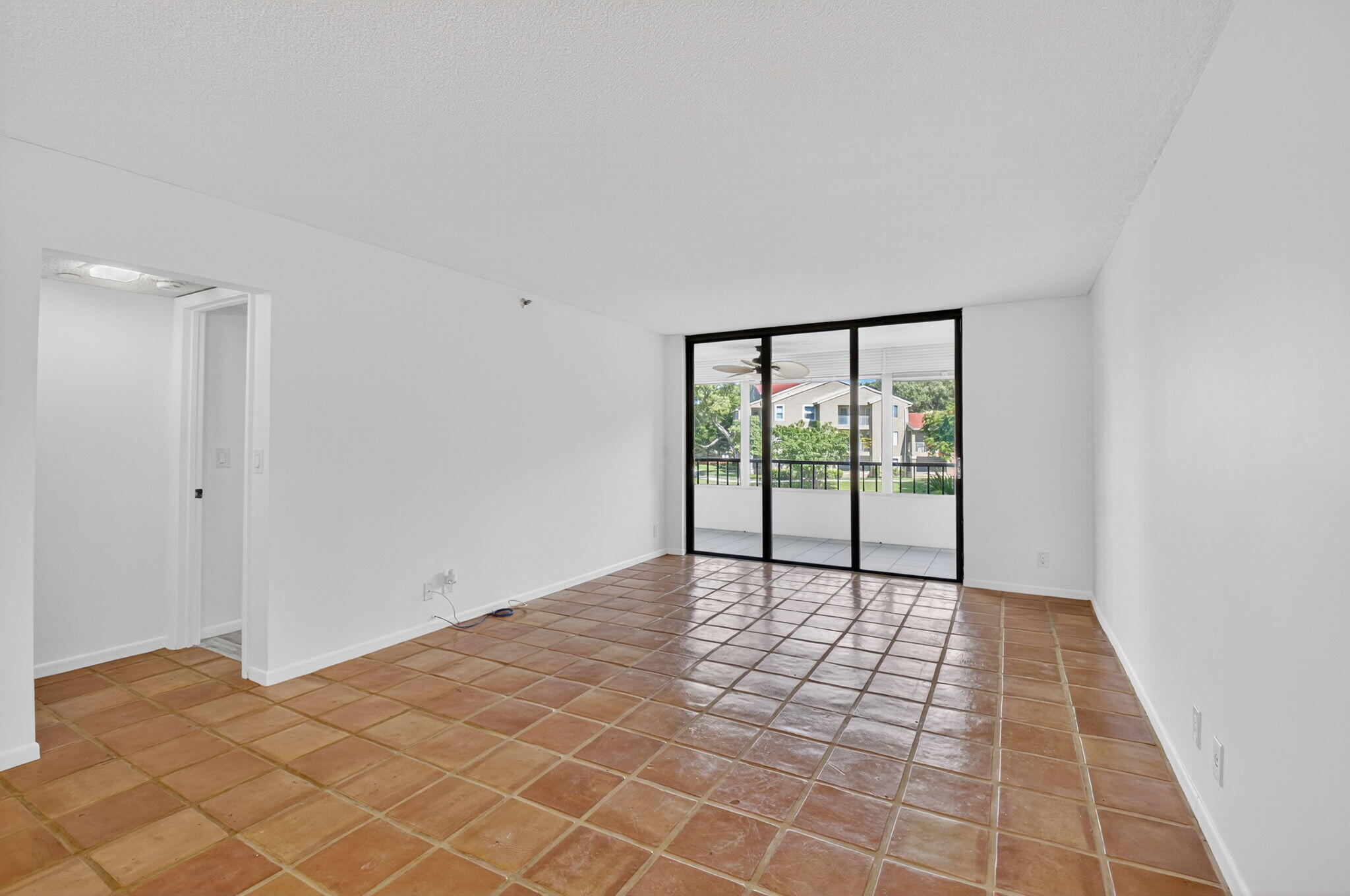 1850 Homewood Boulevard, Unit 214 Delray Beach, FL 33445 - Photo 4 of 38 a view of a room with a large window