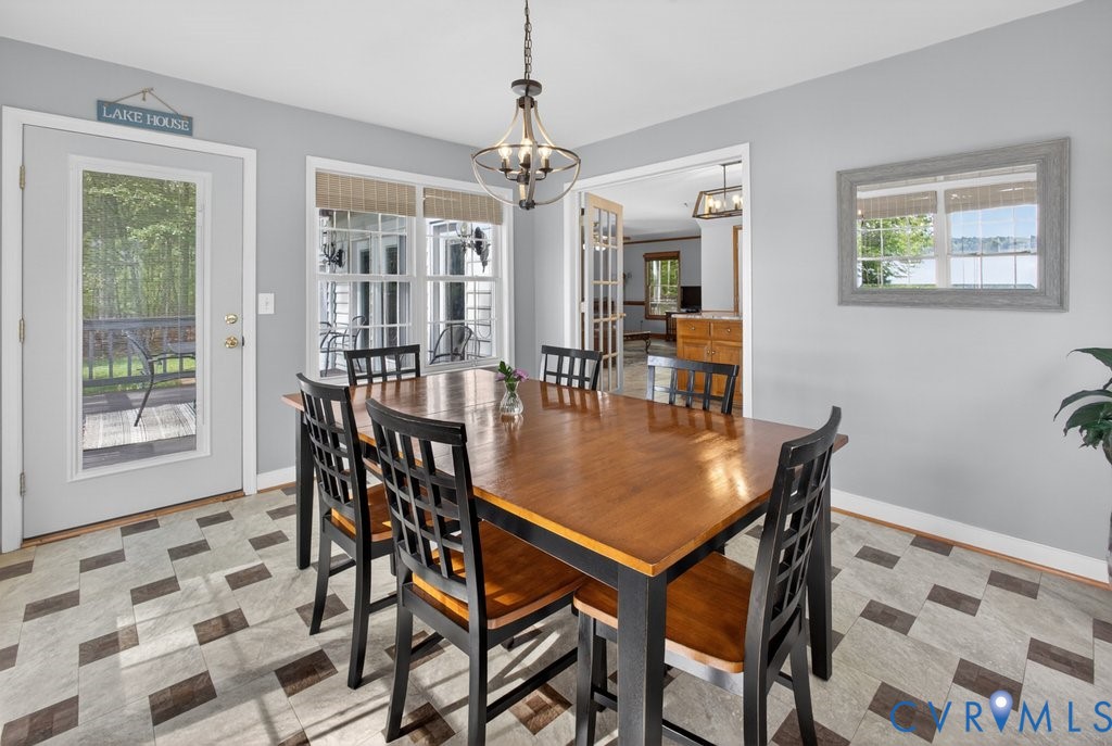 173 Covenant Way Bumpass, VA 23024 - Photo 14 of 63 This dining area features a large table with chair